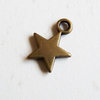 Charm estrella plana, bronce