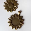 Base colgante flor 18mm, bronce