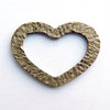Pieza conector de Zamak corazón, bronce